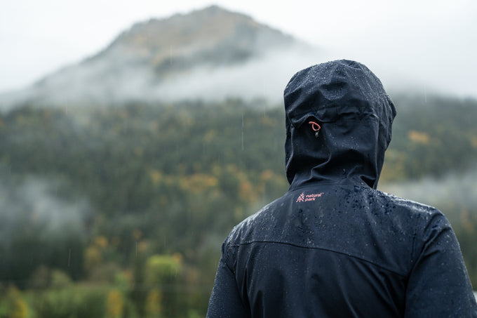 Person in a waterproof jacket in the rain