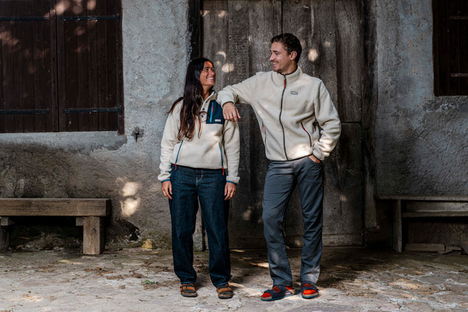 Two people wearing fleece jackets